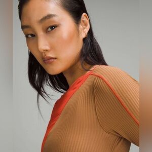 Lululemon Asymmetrical Ribbed Cotton
LongSleeve Shirt in Bold Beige/Solar Orange